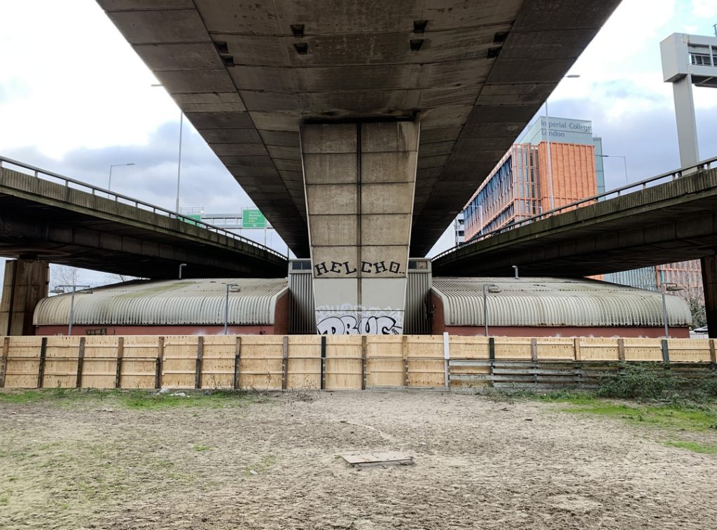 graffiti by Helch on brutalist looking motorway flyover support