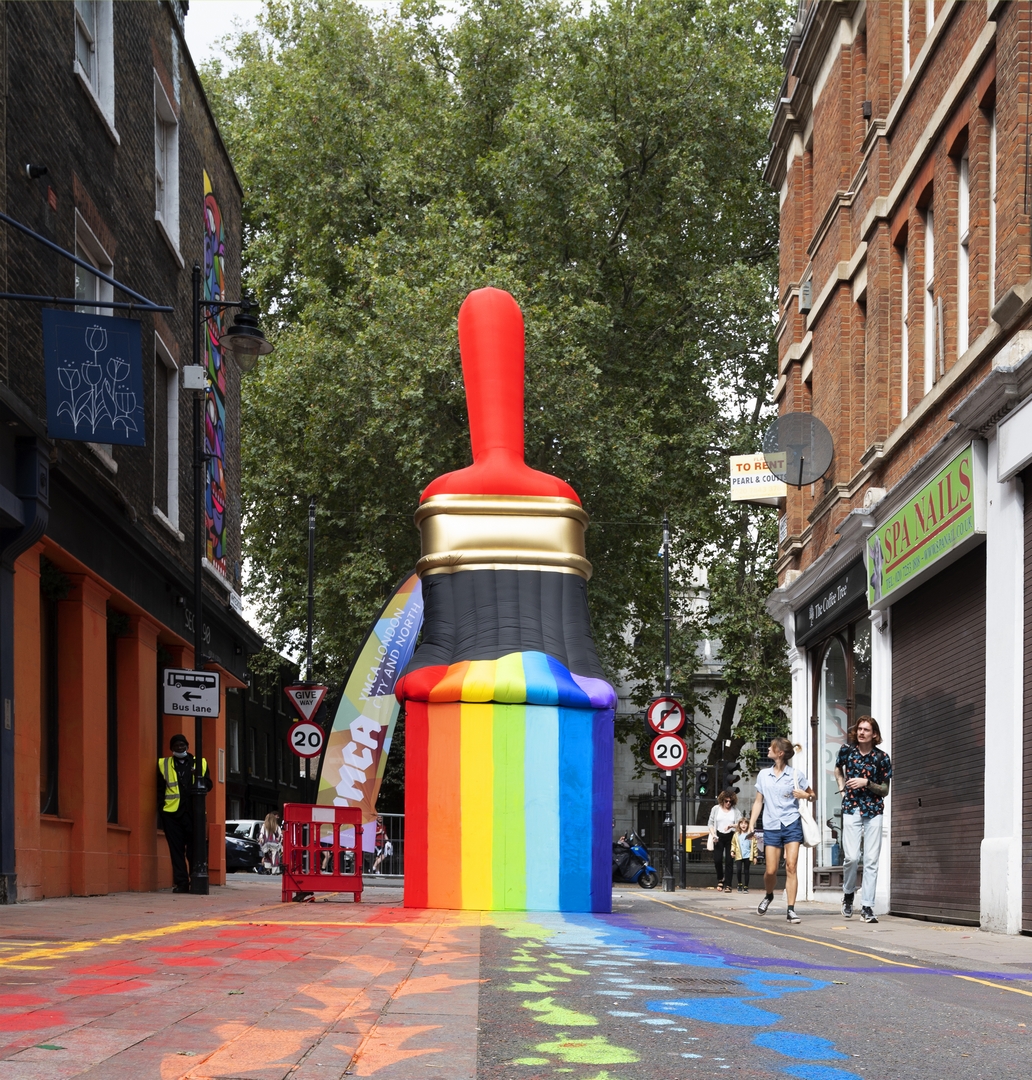 Inflatable paint brush with rainbow colours painted by Stikka ID at Whitecross Street Party