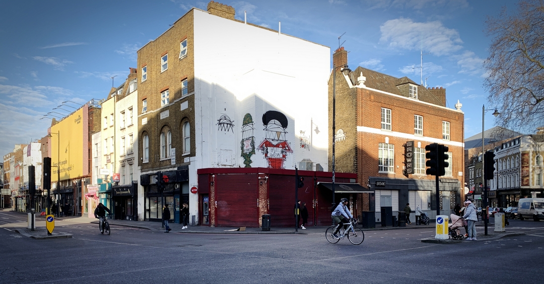 New street art figures by Nathen Bowen on a first floor rooftop at Old street Shoreditch